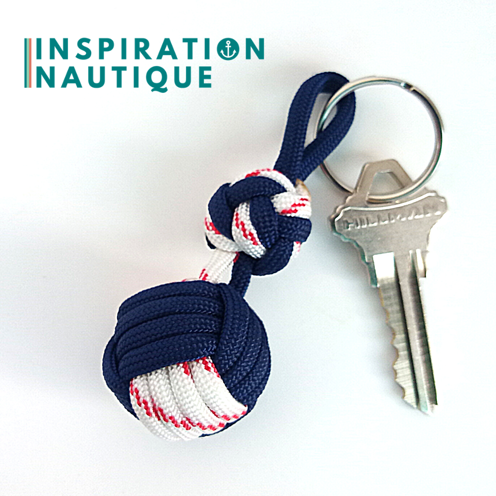 Key ring monkey fist knot and double bosun's whistle knot, Navy and white with red tracer