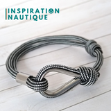 Bracelet marin avec cosse et noeud coulissant, Noir et argenté ligné