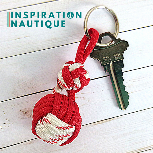 Key ring monkey fist knot and double bosun's whistle knot, Red and white with red tracer